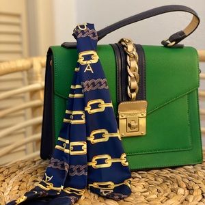 Green and navy blue purse.